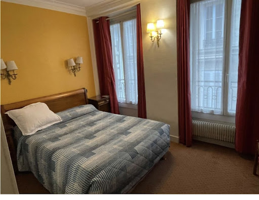 Débarras professionnel de chambres d'hôtel dans le 8e arrondissement de Paris avec évacuation et tri des encombrants-Image1