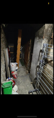 Photo illustrant l’intervention de débarras des encombrants dans les couloirs de caves à Paris 17-Image1