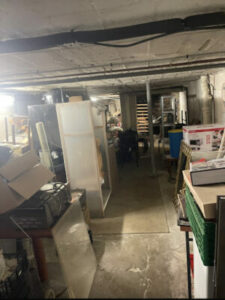 Débarras complet d’un grand sous-sol commercial dans le 20e arrondissement de Paris avec tri et évacuation-Image1