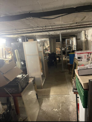 Débarras complet d’un grand sous-sol commercial dans le 20e arrondissement de Paris avec tri et évacuation-Image1